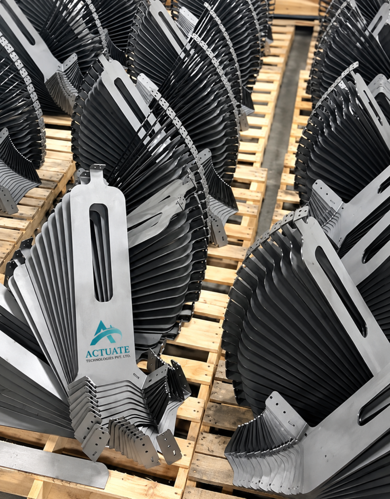 Industrial carbon steel sheet fabrication components stacked on pallets
